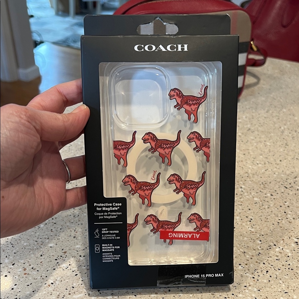 Coach Clear iPhone 15 Pro Max Case with Red Dino Motif
